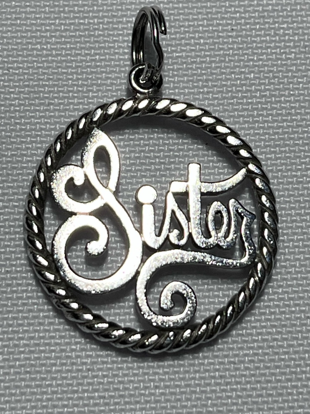 Vintage Sterling Silver 'Sister' Script Charm Pendant
Stamped